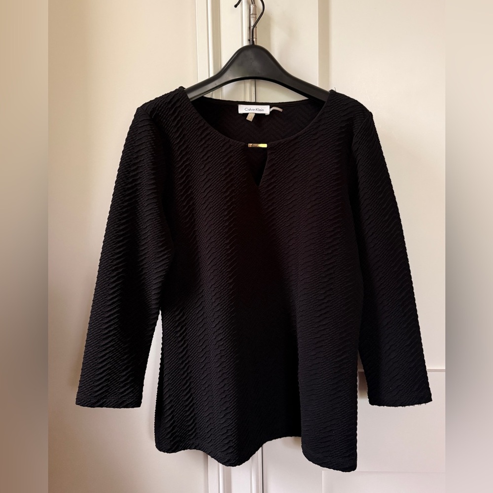 Elegant Calvin Klein black top